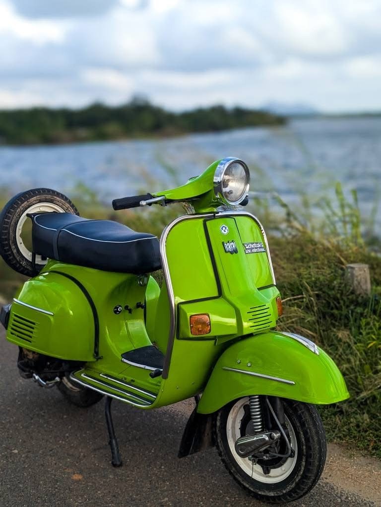 Restored green vintage scooter